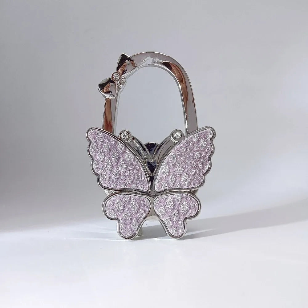Silver foldable butterfly shaped hook for handbags
