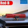A red silicone car emergency hammer with a handle and a metal base is shown on a car interior surface.