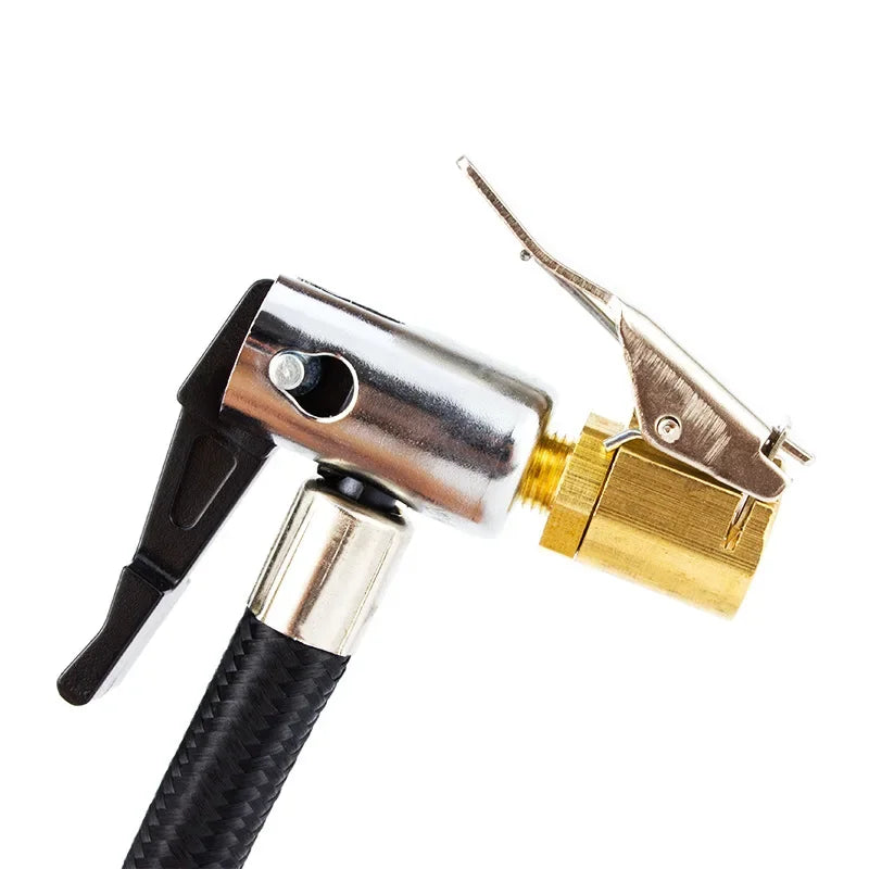 A brass tire inflator chuck with a quick-connect clip and black handle.