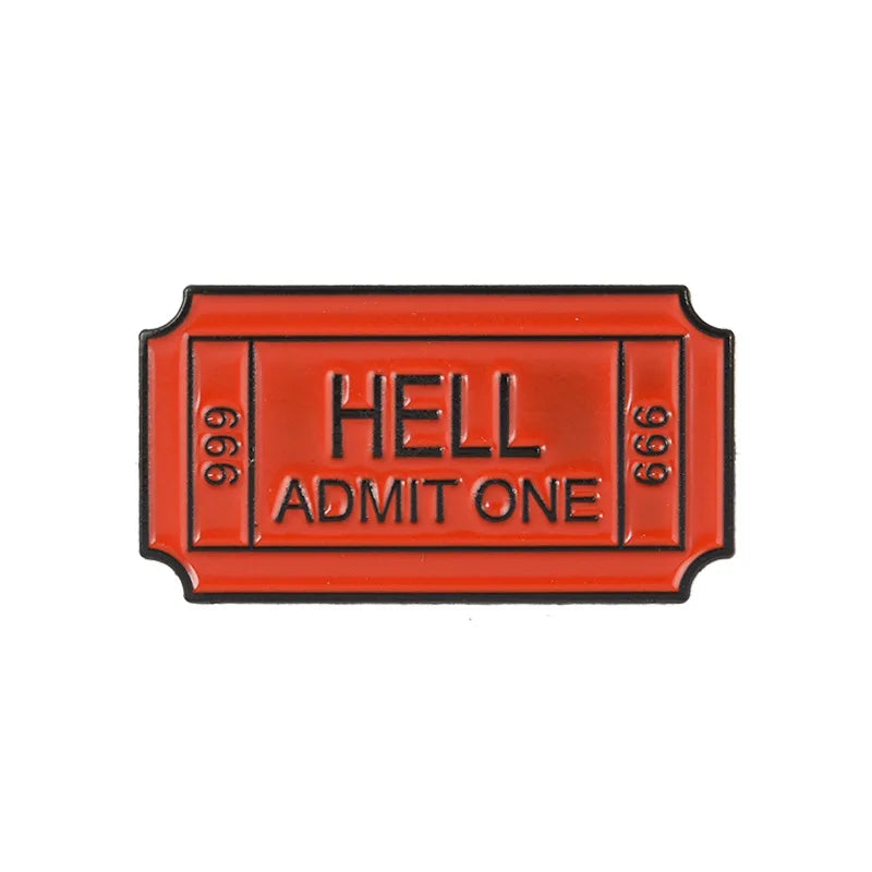Vintage airline ticket enamel brooch featuring the text HELL ADMIT ONE in orange on a rectangular background.