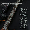 Tree of Life white shell inlay decal applied to a guitar fretboard