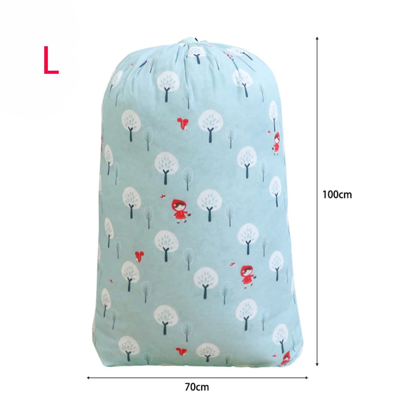 Light blue drawstring laundry bag featuring a pattern of white trees and red figures.