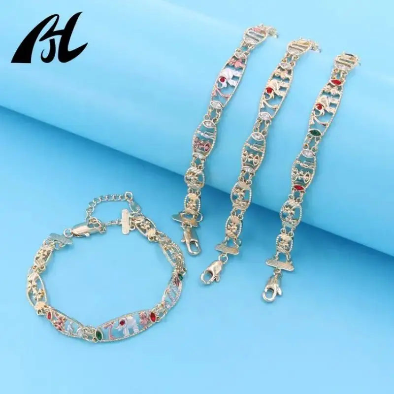 Symbolic Charm Bracelet with Elephant, Horseshoe & Evil Eye Pendants
