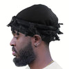 A man wearing a black vintage twist head wrap with tassels, shown in profile.