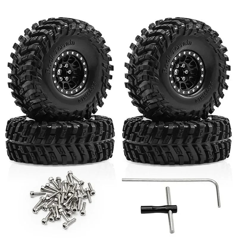 Set of four black metal beadlock RC crawler wheels with tires and mounting hardware