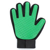 A bright green silicone pet grooming glove with a textured palm and black wrist strap.