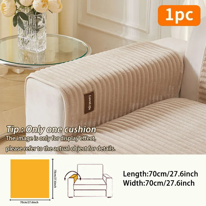 A beige non-slip minimalist sofa cushion cover displayed on a white sofa with a glass table in the background.