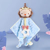 A light blue sensory plush toy resembling a lion with a crown and a matching blanket and teether.