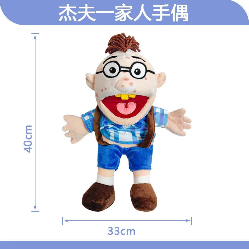 A soft plush hand puppet of a zombie boy with glasses and a stitched smile.