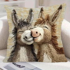 A realistic depiction of two donkey heads in a close embrace on a linen-cotton cushion cover.