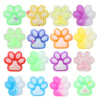 A collection of various squishy cat paw fidget toys in multiple colors including green yellow pink and blue.