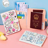 A pink leather passport holder and travel wallet featuring various quirky cartoon animal designs.