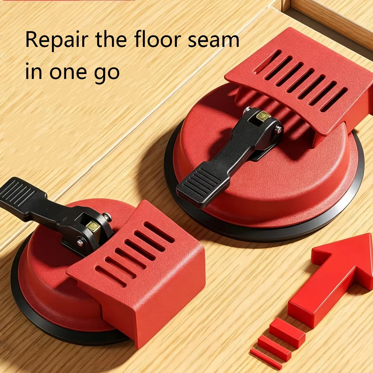 A red heavy-duty floor seam repair tool with a suction cup is shown on a wooden floor.