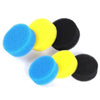 A collection of four replacement filter sponges and pre-biochemical cotton in blue, yellow, and black.