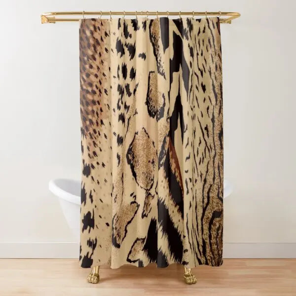 A beige and black leopard print shower curtain hanging from a gold rod.