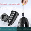 A hand is using a tire repair nail to fix a puncture in a tire.