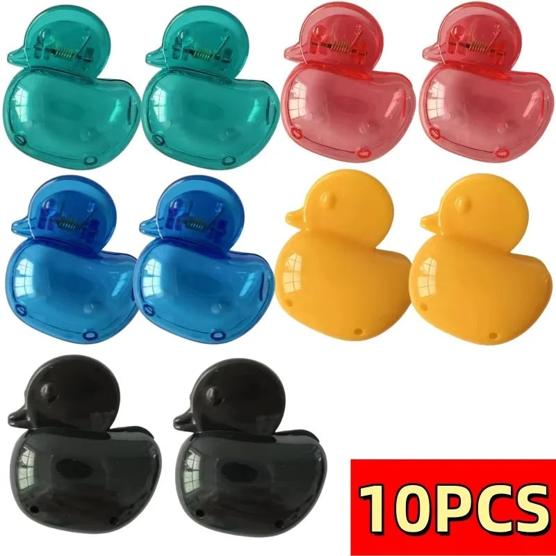 Ten colorful silicone toothbrush head covers in various shades including teal, pink, blue, and yellow.