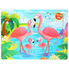 A colorful jigsaw puzzle featuring pink flamingos, tropical plants, and a bright orange sun over blue water.