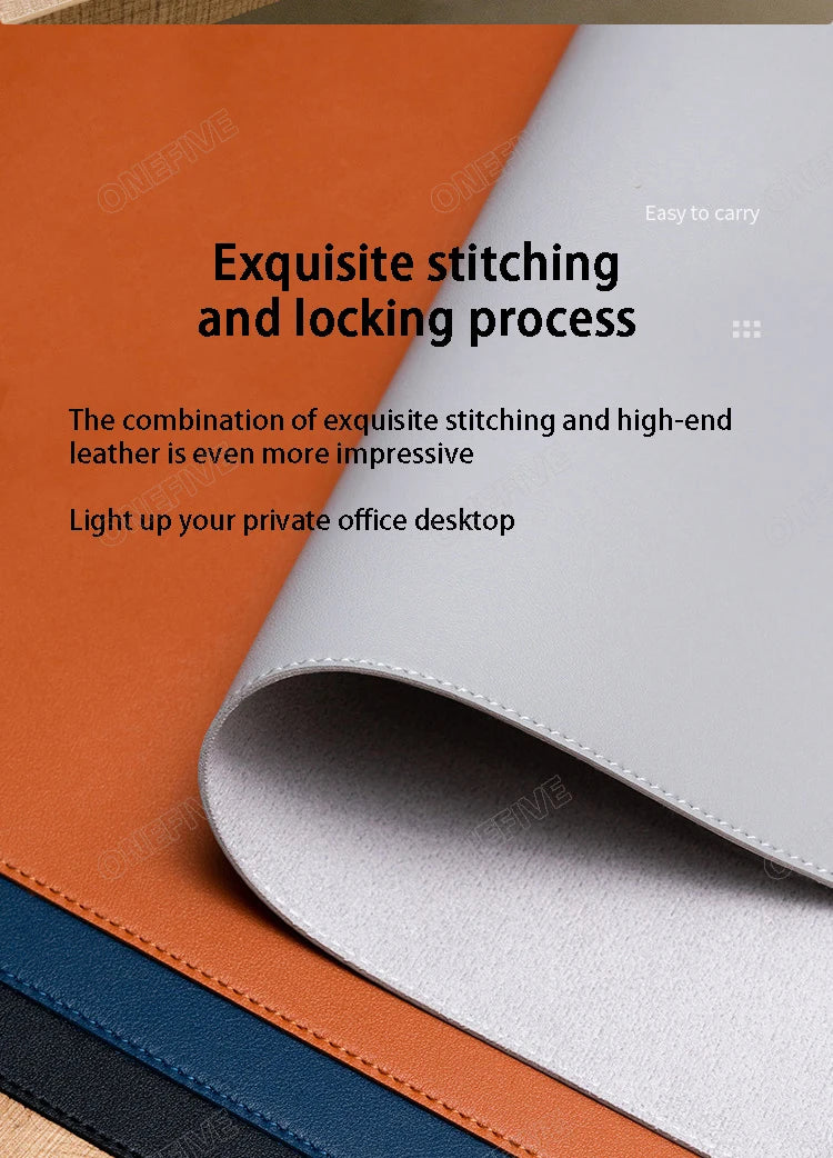 A close-up of an orange leather desk mat with a white folder, showcasing exquisite stitching and a professional office setup.