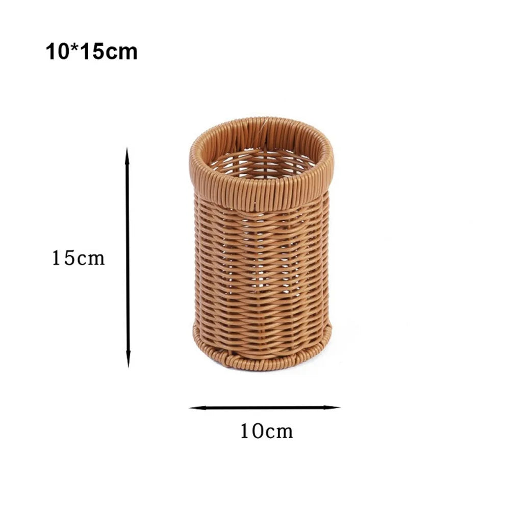 A cylindrical handwoven wicker serving basket with a lid, made of natural brown material.