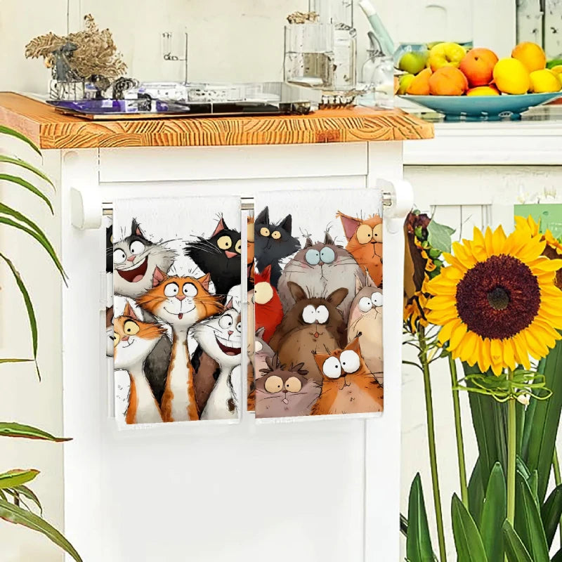 A set of two cartoon cat kitchen towels featuring various feline characters in watercolor style.