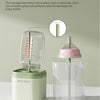 A clear storage box with a silicone baby bottle brush drying rack and a plastic baby bottle.