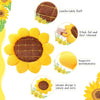 A yellow sunflower shaped floor pillow with brown accents and fluffy texture.