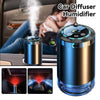 A sleek, metallic car diffuser humidifier with ambient star light projection shown in a vehicle interior.