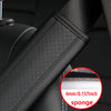 Close-up of a black PU leather embossed seat belt shoulder cushion with a sponge layer.