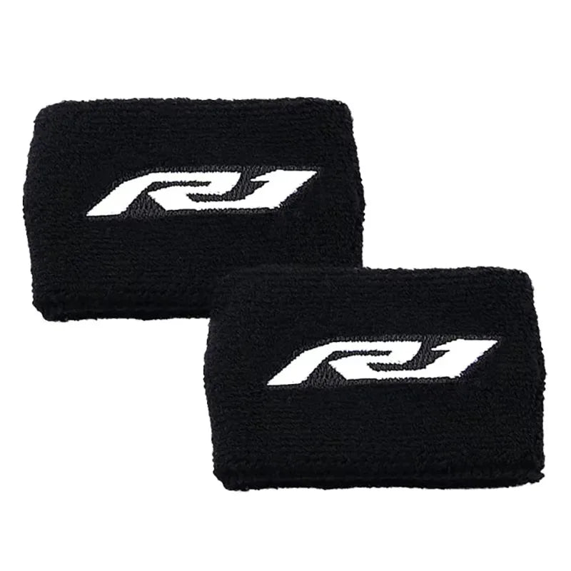 Black fabric cover sock with a white R1 logo for a brake fluid reservoir.