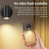A hand holds a rectangular magnetic rechargeable touch light illuminating a soft glow.