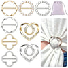 A collection of gold and silver metal rings and clips designed for fastening shirts and scarves.