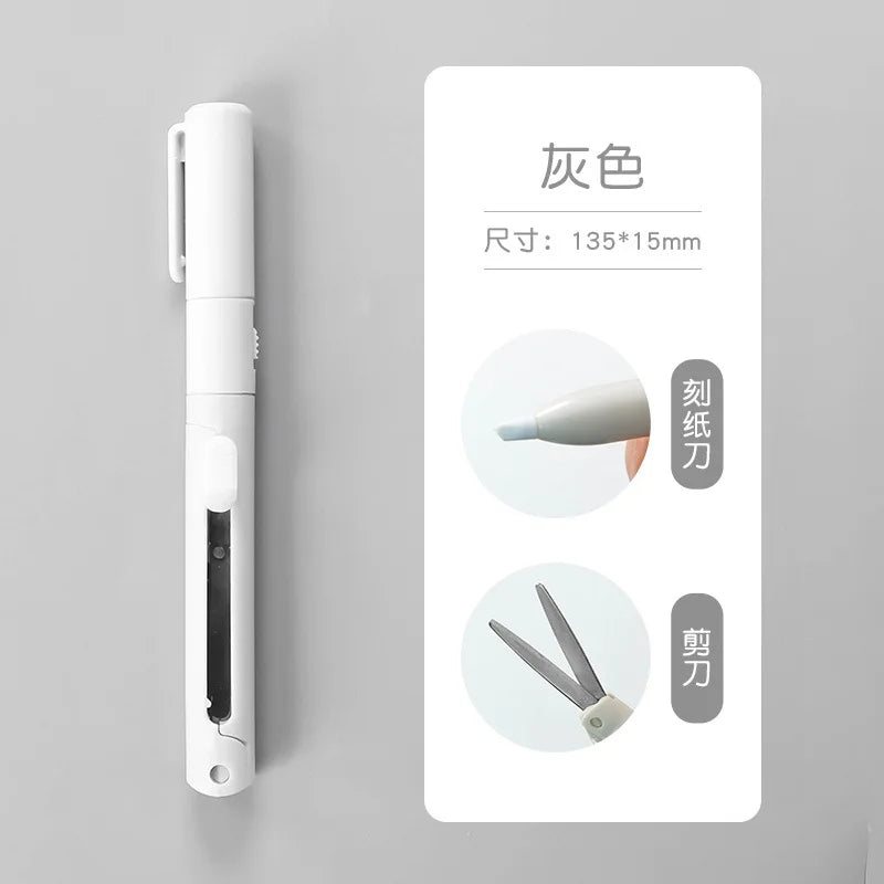 A white folding pen-shaped safety scissors with measurements and usage instructions displayed on a card.