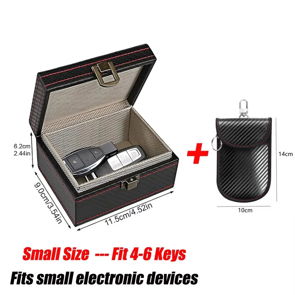 A black carbon fiber box with a lid is shown next to a small black pouch, designed for storing keys and electronic devices.