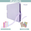 Purple scrapbook album with a ribbon and two colored corner stickers and two decorative stickers