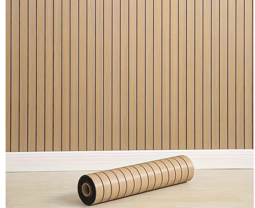 Roll of light wood-toned peel-and-stick wall panels installed on a vertical wooden slat background.