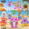 A collection of colorful Fuggler Ugly Monster plush toys and related items displayed on a wooden structure.
