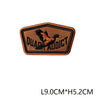 An embroidered hunting patch badge with the text QUACK ADDICT on an orange background.