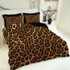 A brown leopard print duvet cover set with matching pillowcases displayed on a white bed.