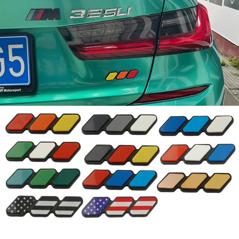 A collection of 3D tri-color grille emblem stickers in various colors and designs for Toyota trucks and SUVs.