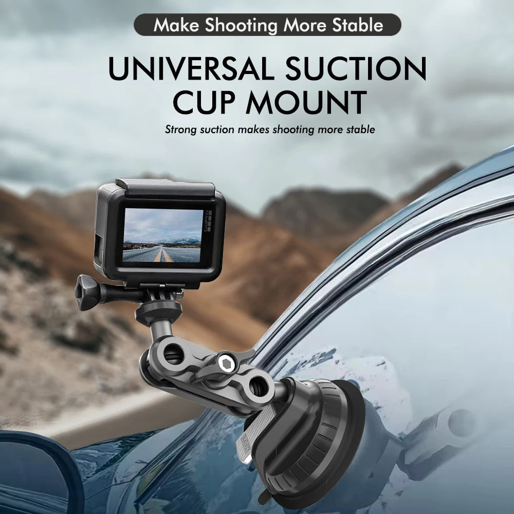 A universal suction cup mount is attached to a car window, holding an action camera.