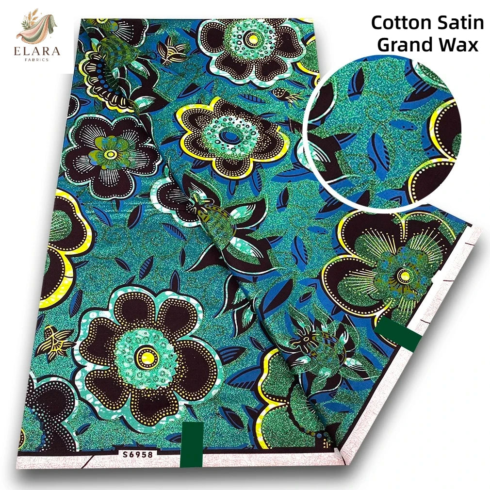 Cotton Satin Grand Wax fabric featuring a vibrant teal and black floral pattern.