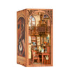 A wooden bookstore diorama kit featuring arched shelving and decorative elements with internal LED lighting.