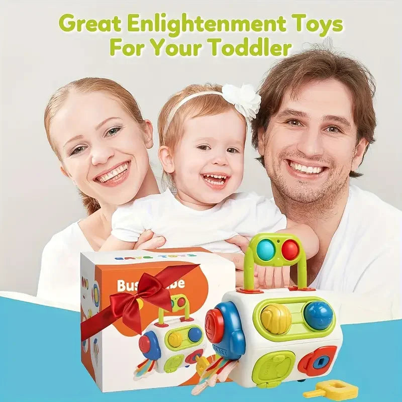 A family with a toddler is shown holding a multi-functional sensory learning toy cube for toddlers.
