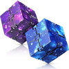 Three purple and blue cosmic foam stress balls stacked and displayed on a reflective surface.