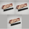 A black willow wood wishing stick with a gift box featuring a design of a face and text.
