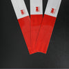 Three strips of red and white reflective decals are displayed against a black background.