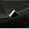 A black car seat cover shows a smartphone resting on the leather surface.