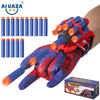 A hand wearing a red and blue spider web shooter glove with multiple foam darts and a box.