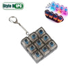 A silver keychain featuring a square grid of blue LED lights with a keyboard design.